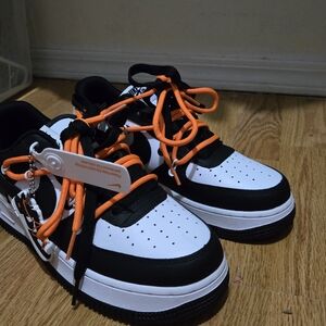 Nike Black and White Sneakers with Orange Laces